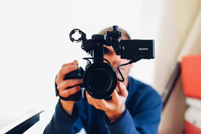 a man holding a camera